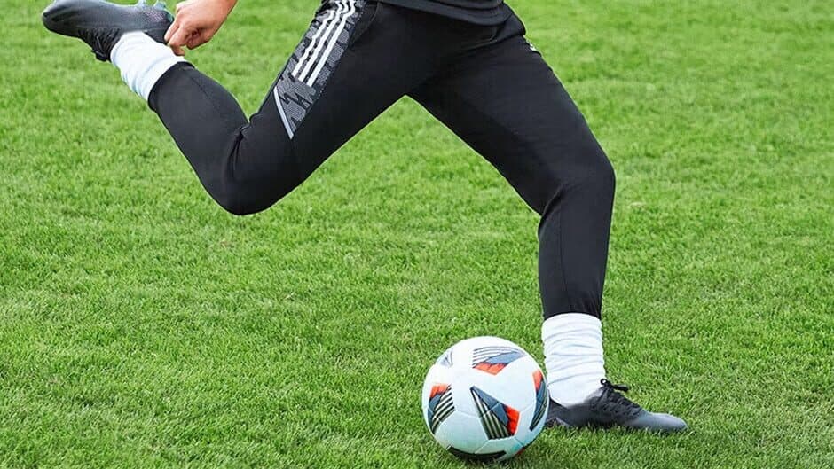 Kicking The Ball Over Mountains Of Stuff banner